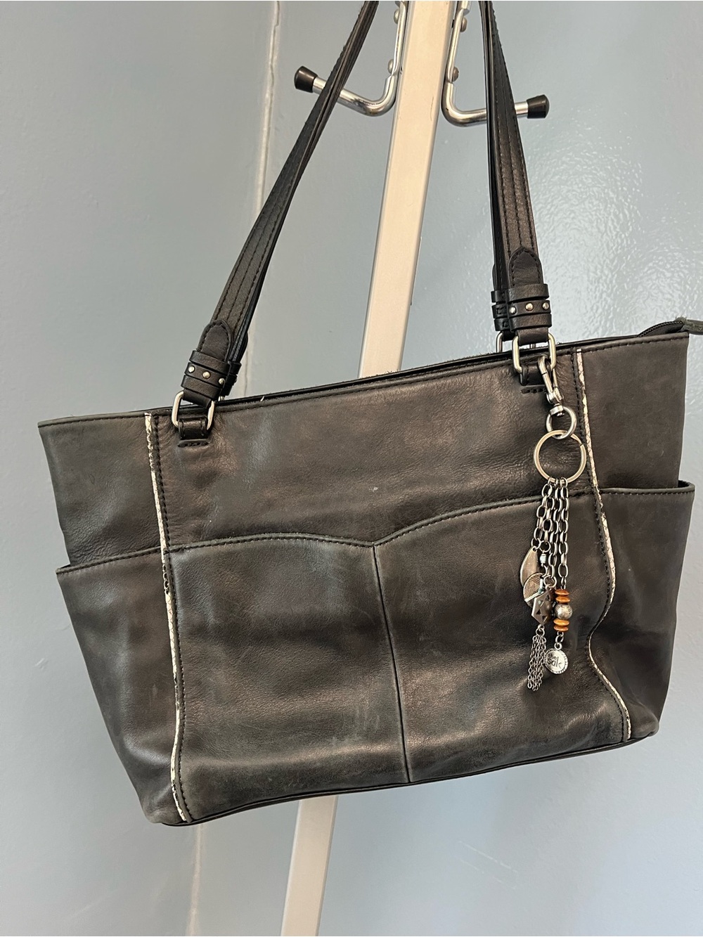 The Sak Black Leather Shoulder Tote with Charm Accent